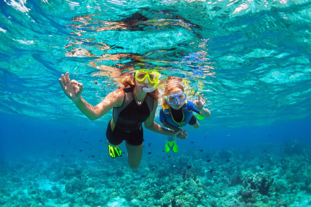 Mother and daughter enjoy Florida Gulf Coast snorkeling.