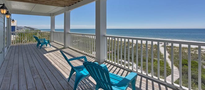 Florida beach patio with deck chairs.