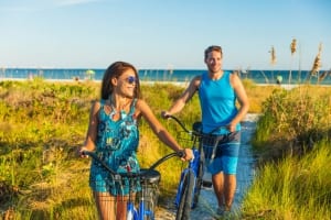 Photo of a Couple Bicycling near the Gulf, One of the Best Things to Do in Cape San Blas, Florida.